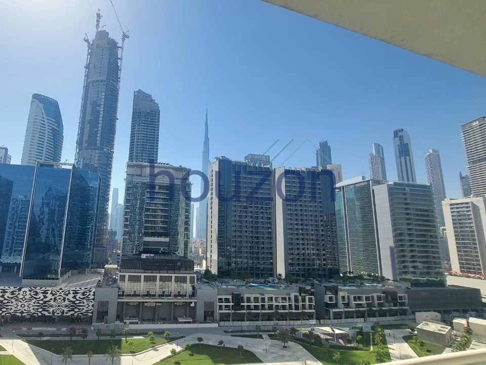 Modern 2BR | Burj View | Investors Deal