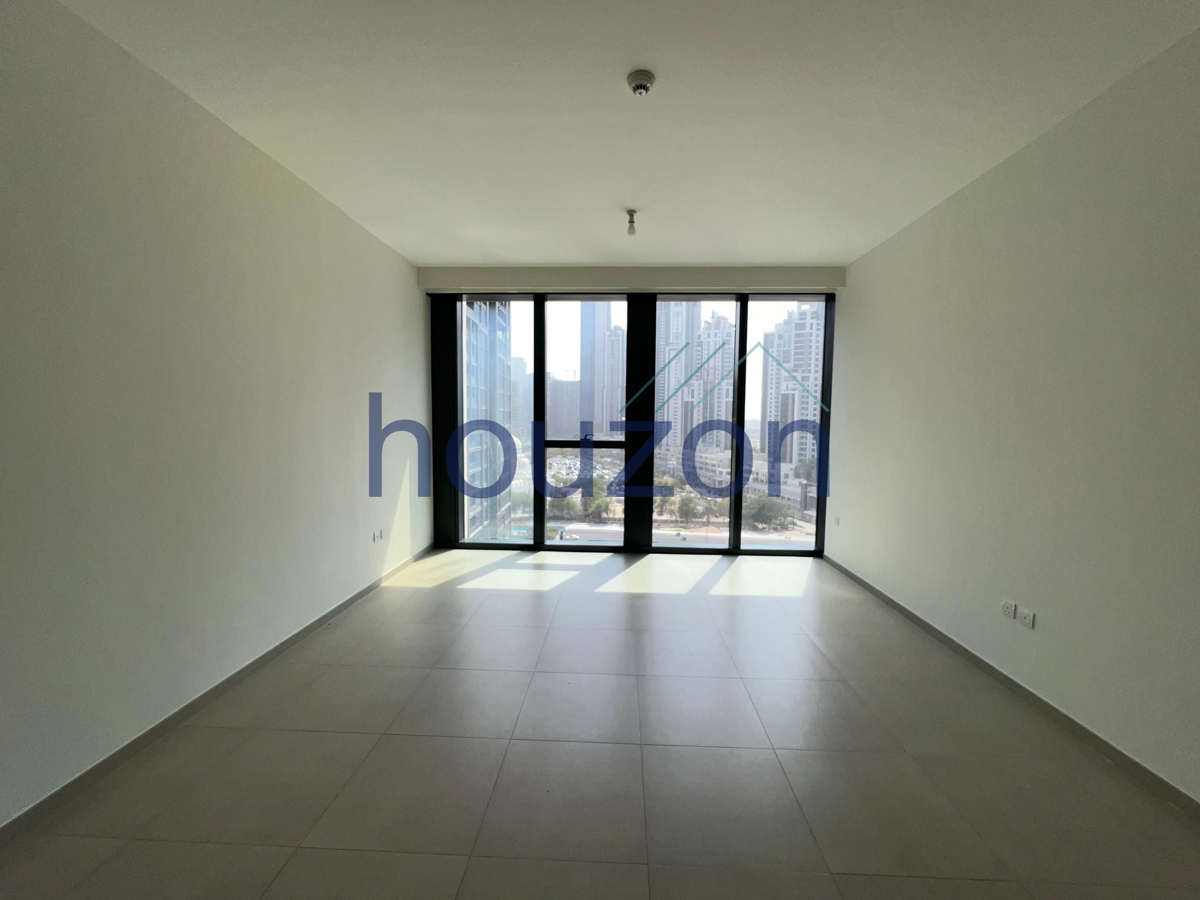 Bright 1BR | BLVD + Pool Views | Vacant